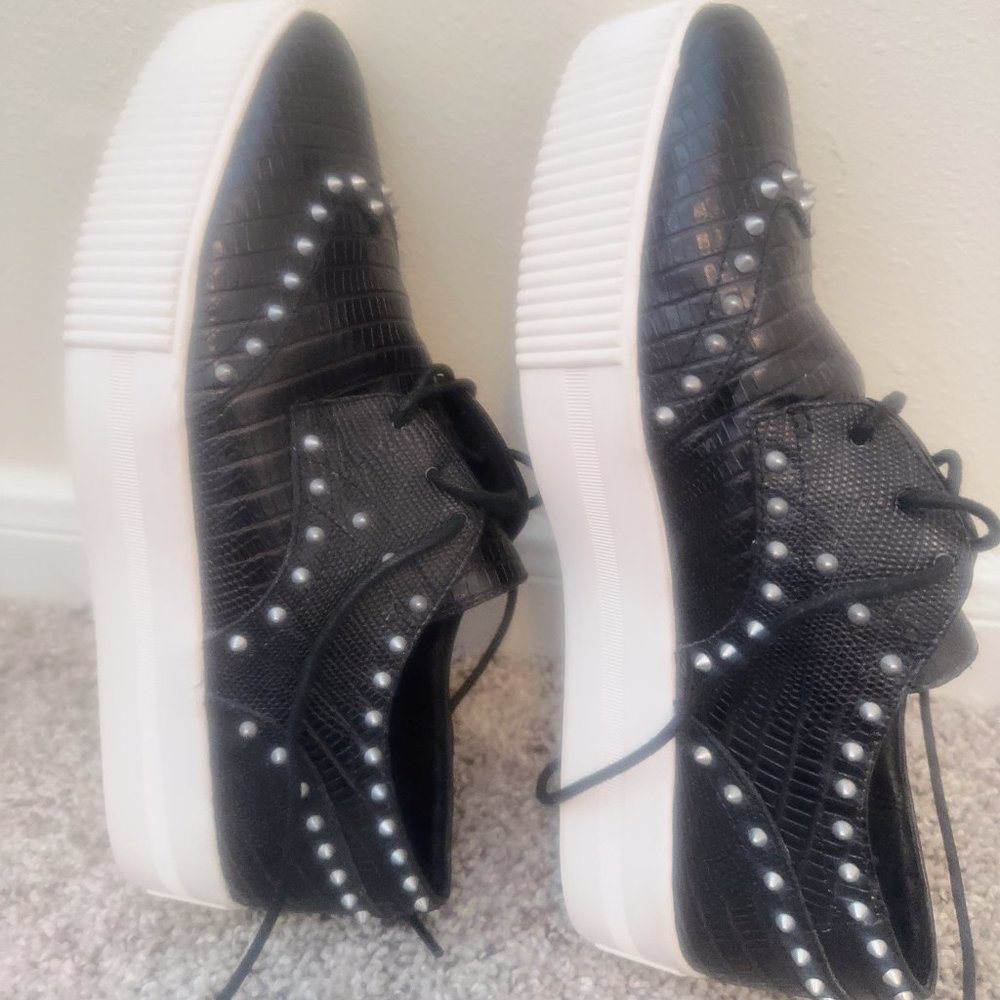Ash Krush black studded leather platform shoes in size 39, featuring a 2.5-inch